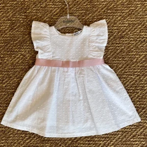 Abitino in cotone bianco con fiocco